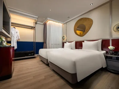 Chambre twin supérieure avec fenêtre intérieure — GRAND HOTEL du LAC Boutique Saigon